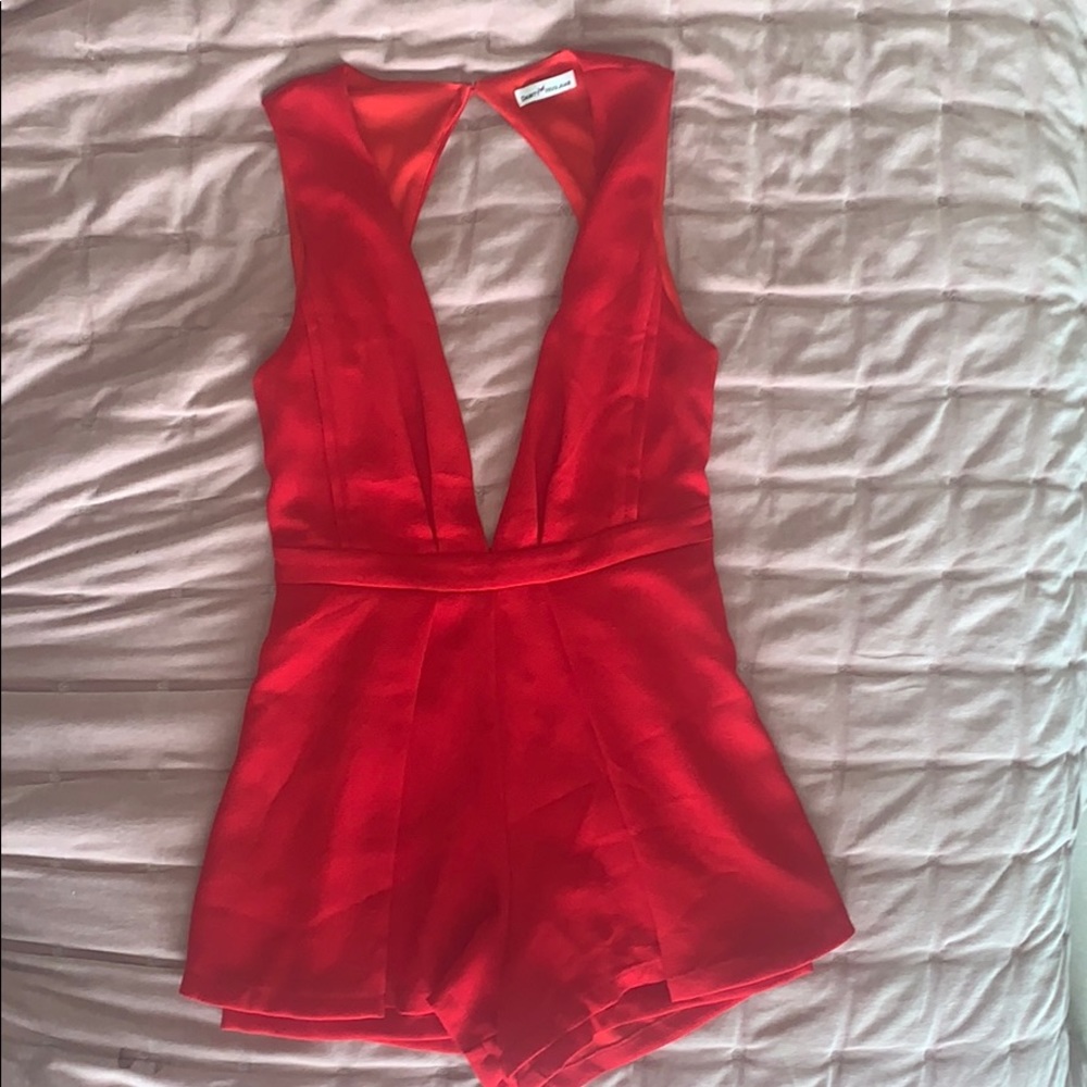 Red low v and backless romper